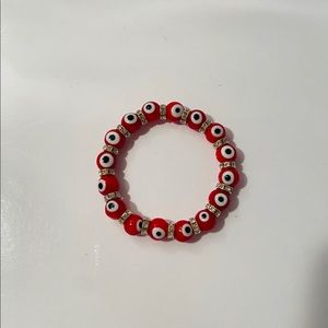 Red evil eye bracelet. #evileyebymaria